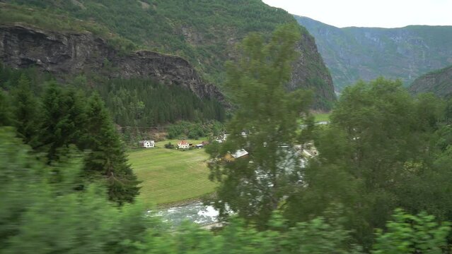 Top view of the Flame village from the train window. The Flam Railway one of the most beautiful train journeys in the world and is one of the leading tourist attractions in Norway.