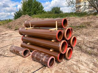 Industrial Pipeline Landscape. Big Brown Pipes at Building Site