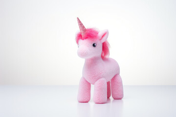 Toy Pink Unicorn On White Background. Generative AI