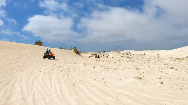 Quad biking at Lancelin Sand Dunes, Western Australia.