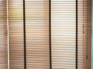Home blinds - cordless cellular honeycomb pleated shade  automated curtains blind. Closeup photo, blurred.