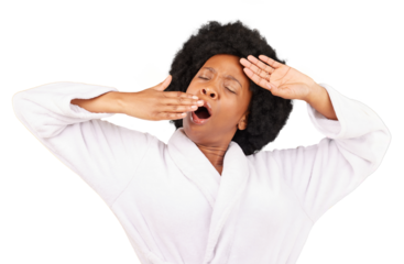 Yawn, morning and wake up of black woman with afro in bathrobe isolated on a transparent PNG background. Relax, tired or rest of an exhausted young African female yawning or stretching after sleeping