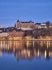 Fototapeta na wymiar Idyllic scene of Sodermalm in Stockholm situated beside a tranquil lake in Sweden