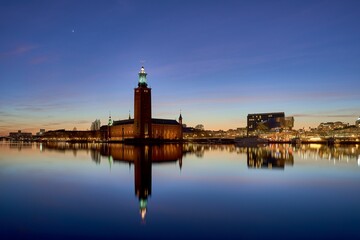Vibrant evening scene of the Stockholm City Hall at sunset in Sweden