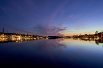 Idyllic scene of Stockholm cityscape on the shore at sunset in Sweden