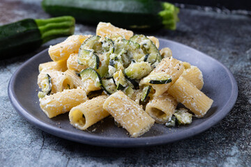 Macaroni pasta with zucchini and ricotta cheese. Perfect for vegetarian and healthy diet.