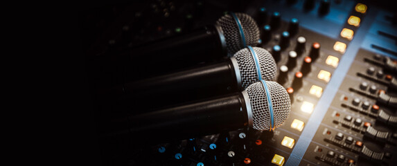 Close-up microphone and sound mixer in studio for sound record control system and audio equipment...