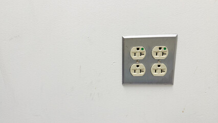 electrical outlet symbolizes modern connectivity and power, enabling access to energy and communication in a technological world