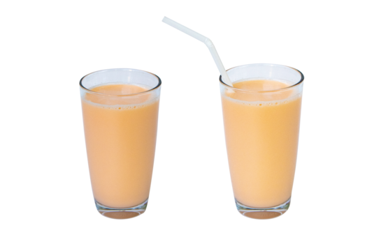 Lactic fermentation beverage color light orange sour taste or yogurt in two type glass tall with straw plastic. Fermented milk has vitamin B2. Isolated on cut out PNG. Lactobacillus acidophilus.