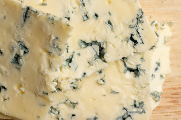 Cheese with blue mold cut into pieces
