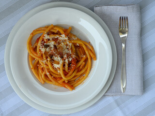 Bucatini all Amatriciana Italian Pasta from Lazio and Rome with Guanciale and Tomatos