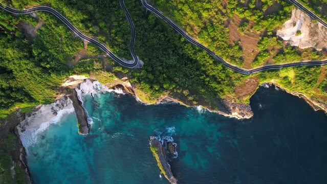 Aerial drone flight above Manta Bay area at Nusa Penida island near Bali. Astounding, idyllic, beautiful bird eye view scenery vivid colorful tropical marvel