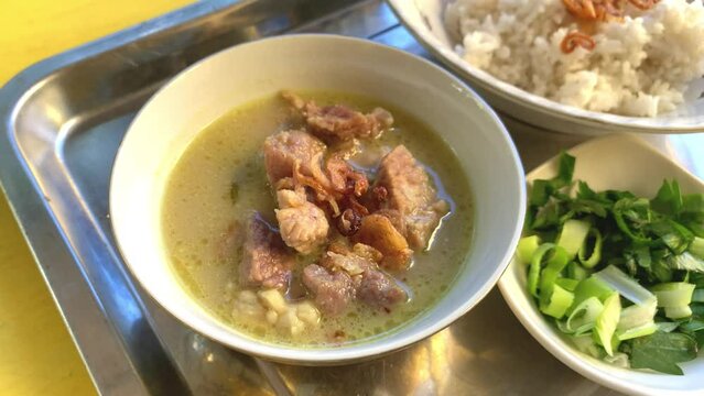 Coto Makassar or beef soup, traditional culinary from Makassar, South Sulawesi, Indonesia.