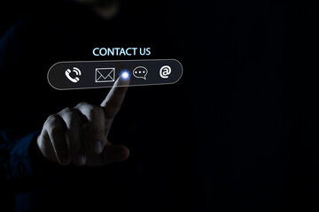 Businessman touching icon mobile phone, mail, telephone and address. Customer service call center contact us concept.customer support hotline.contact us concept