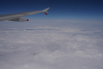 Fototapeta premium airplane in the sky, clouds