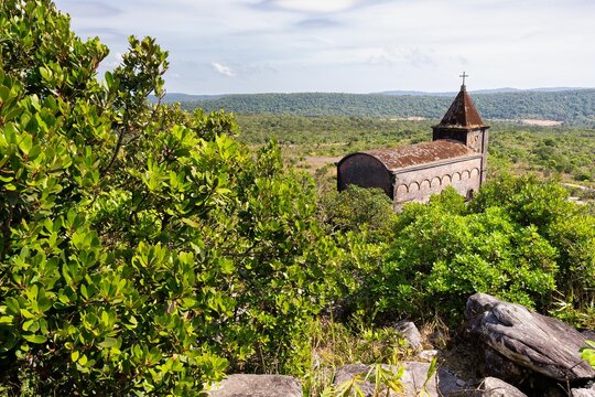 Bokor Catholic Church on a hill on a sunny day in Cambodia