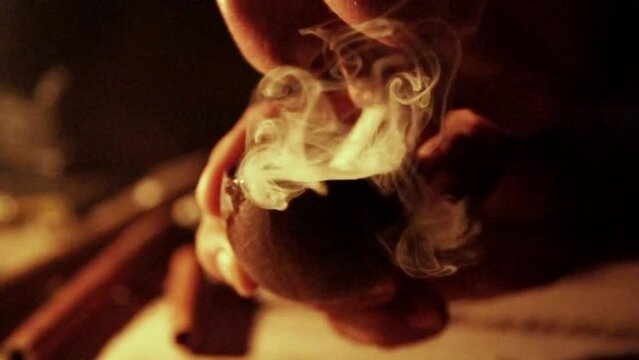 Closeup footage of a male inhaling the vapor of a hot South American medicine