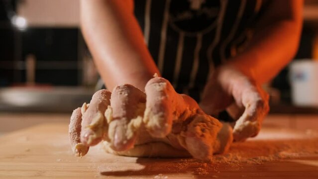 mixing eggs with flour to make dough, pulling and pushing dough, fa01