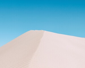 Fototapeta na wymiar Scenic view of huge sand dunes at the Dunas de Taton, Catamarca, Argentina.