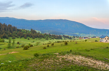 Fototapeta na wymiar Scenic Panorama: Mount Vlasic Foothills and Green Meadows