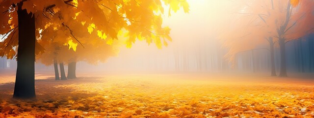 Beautiful bright colorful autumn landscape with a carpet of yellow leaves and a light slight haze mist. Natural park with autumn trees on a bright sunny day.