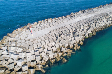 A breakwaters and harbor pier. Aerial view from drone.