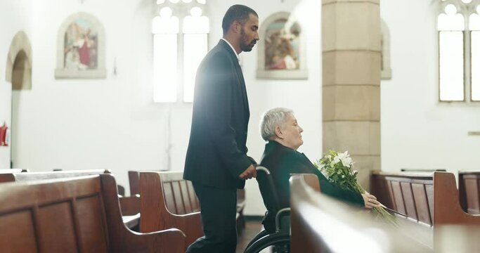 Sad, funeral and church with old woman and wheelchair user for death, mourning and widow. Depression, grief and help with person with a disability at chapel for bereavement, burial ceremony and loss