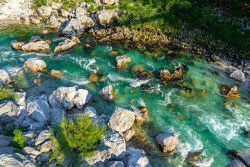 crystal clear turquoise Soca river in Slovenia near Kobarid and Bovec famous for sport activities rafting kayaking