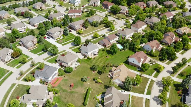 Aerial View From Above Suburban Neighborhood Lowering Shot