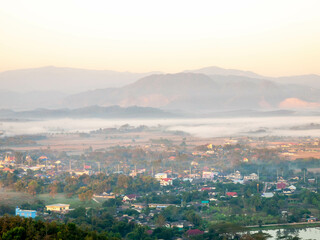 Fototapeta premium Natural viewpoint, mountains, hills, forests and river under morning mist in Chiangrai, Thailand