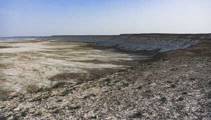 Panorama of the Kazakh steppe and a cliff with chalk deposits, a desert in place of the ocean