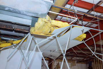 Reconstruction ceiling works interior buildings with dismantling of a old ceiling in construction complex