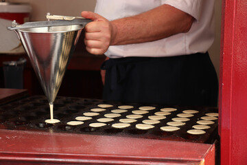 Traditional Dutch Poffertjes, cereal pancakes