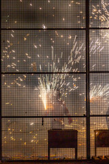 Men celebrate the "Cordá" festival, which consists of locking themselves in a metal cage and shooting rockets and other fireworks