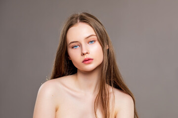 Naklejka premium portrait of a young woman, facial skin care 