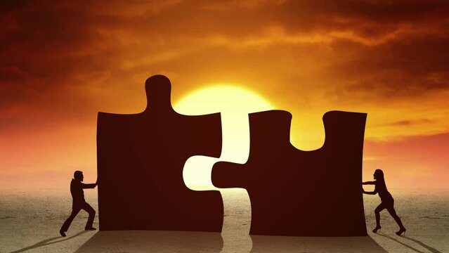 Silhouette of two businesspeople assemble two big jigsaw with sun rising timelapse