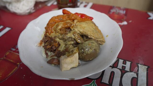 Nasi gudeg served on a plate