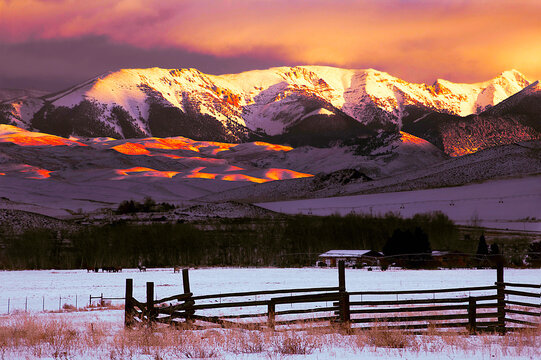 Stormy Snowy mountain peaks
