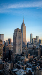 Fototapeta na wymiar Empire State Building New York City Blue Sky Golden Hour Sunset
