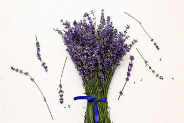 Bouquet of beautiful lavender flowers on light background