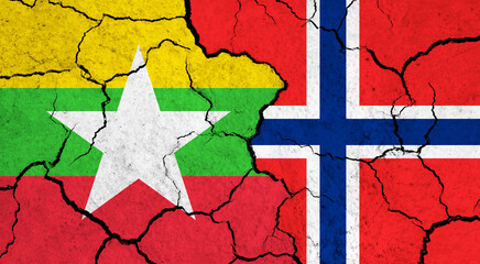 Flags of Myanmar and Norway on cracked surface - politics, relationship concept