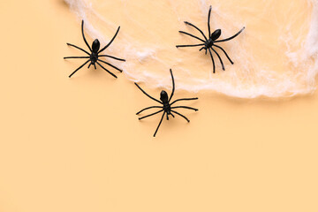 Cobweb with spiders for Halloween party on yellow background
