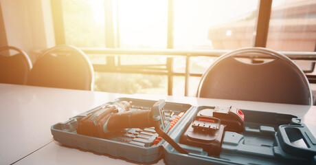 construction concept Hand tools with modern professional equipment.