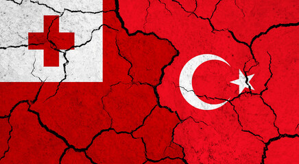 Flags of Tonga and Turkey on cracked surface - politics, relationship concept