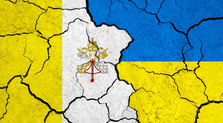 Flags of Vatican City and Ukraine on cracked surface - politics, relationship concept