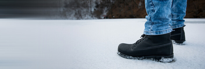 man feet in snow