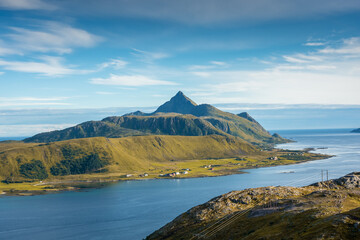 Beautiful landscape of the Lofoten Islands during the golden hour, view from Offersoy Mount trail,  Norway