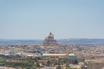 Fototapeta na wymiar Cathedral of Gozo and the city of Victoria from above, Malta