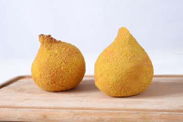 Traditional brazilian snack coxinha isolated on white background Chicken coxinha. potato dumpling...