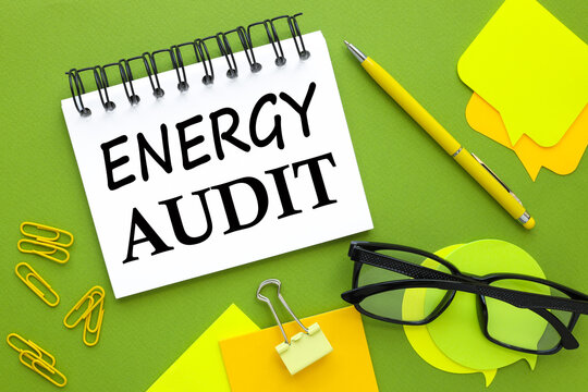 green background. bright stickers. yellow paper clips. text on white paper energy audit